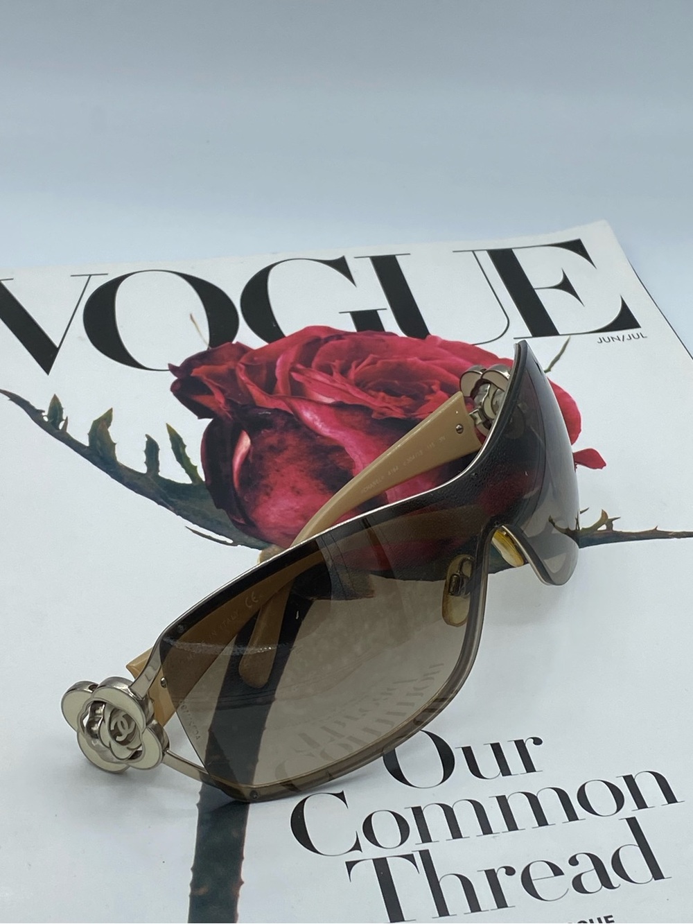 CHANEL Brown Gradient Shield Sunglasses with Gold Camellia Accents